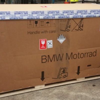 BMW Motorrad branded shipping box on a pallet